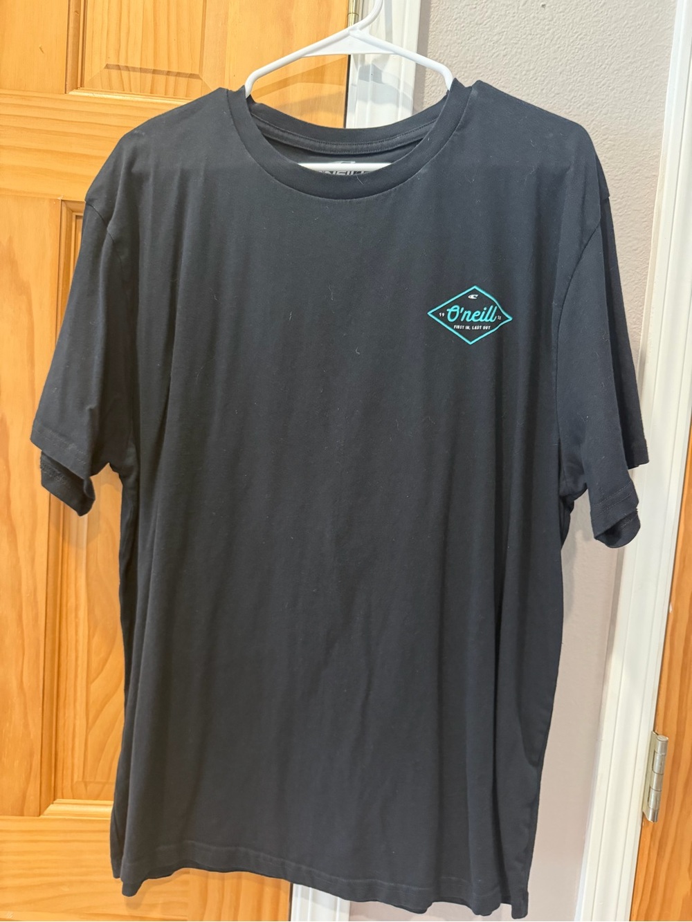 O'Neill Black Short-Sleeve Tee with Teal Chest Logo